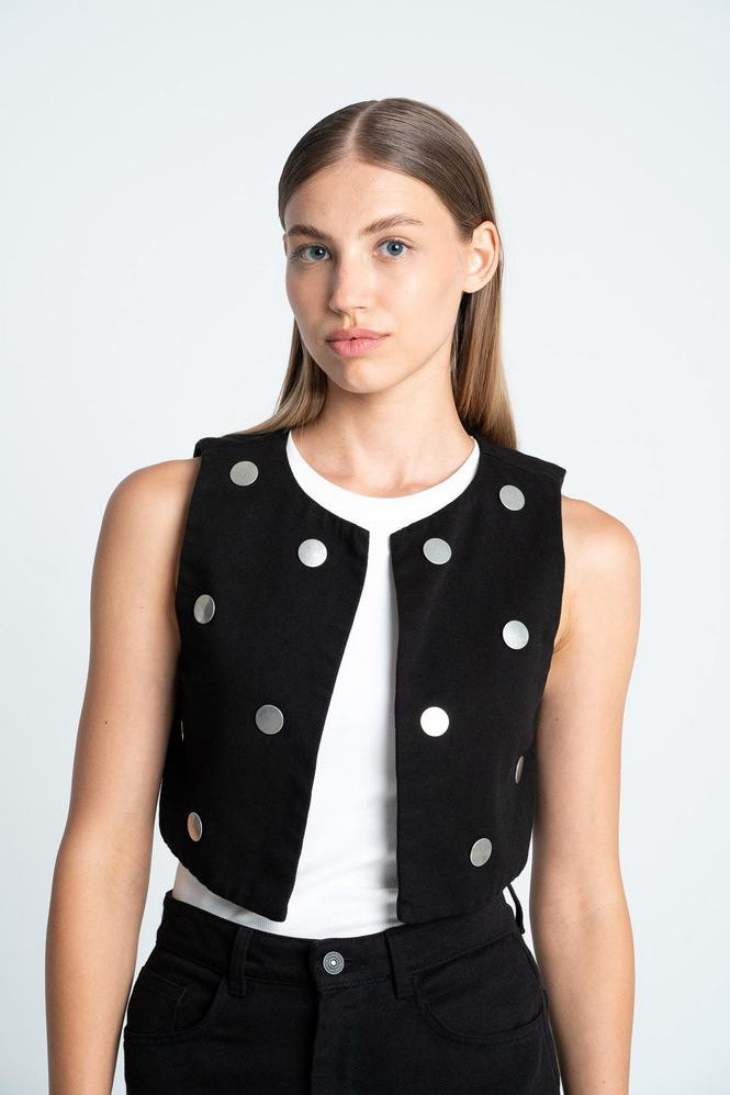 Chaleco-Con-Taches-ARKITECT-85462-3703453_a_1fa99b33-0960-4d1d-99a8-cf43ac4d6e92.jpg