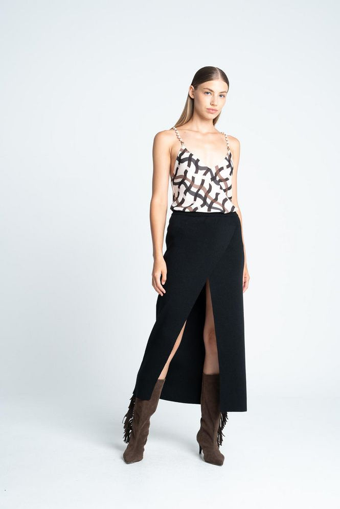 Falda-Larga-Tejida-Di-ARKITECT-85490-3702419_a_a091d7ba-7547-4d24-a501-469cf0aed9bf.jpg